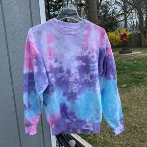 ariana grande tie dye ‘god is a woman’ crewneck